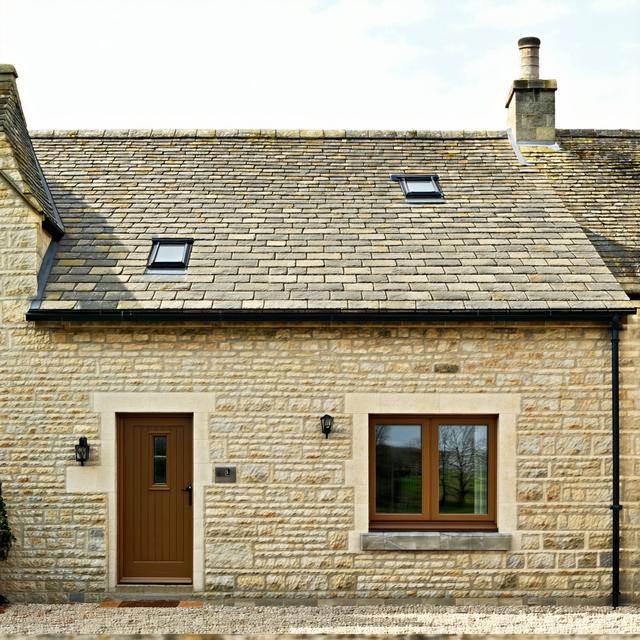 Cotswold cottage row after roofing